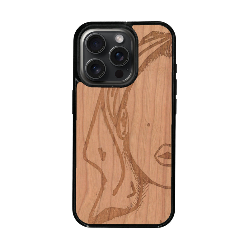 Coque de protection en bois véritable fabriquée en France pour iPhone 16 Pro représentant une silhouette féminine épurée de type line art en collaboration avec l'artiste Maud Dabs