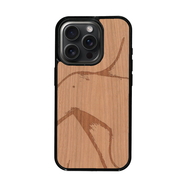 Coque de protection en bois véritable fabriquée en France pour iPhone 16 Pro représentant une silhouette féminine dessinée à la main par l'artiste Maud Dabs