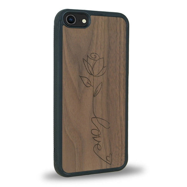 Coque de protection en bois véritable fabriquée en France pour iPhone 5 / 5s sur le thème de la fête des mères avec un motif représentant une fleur dont la tige forme le mot "love"