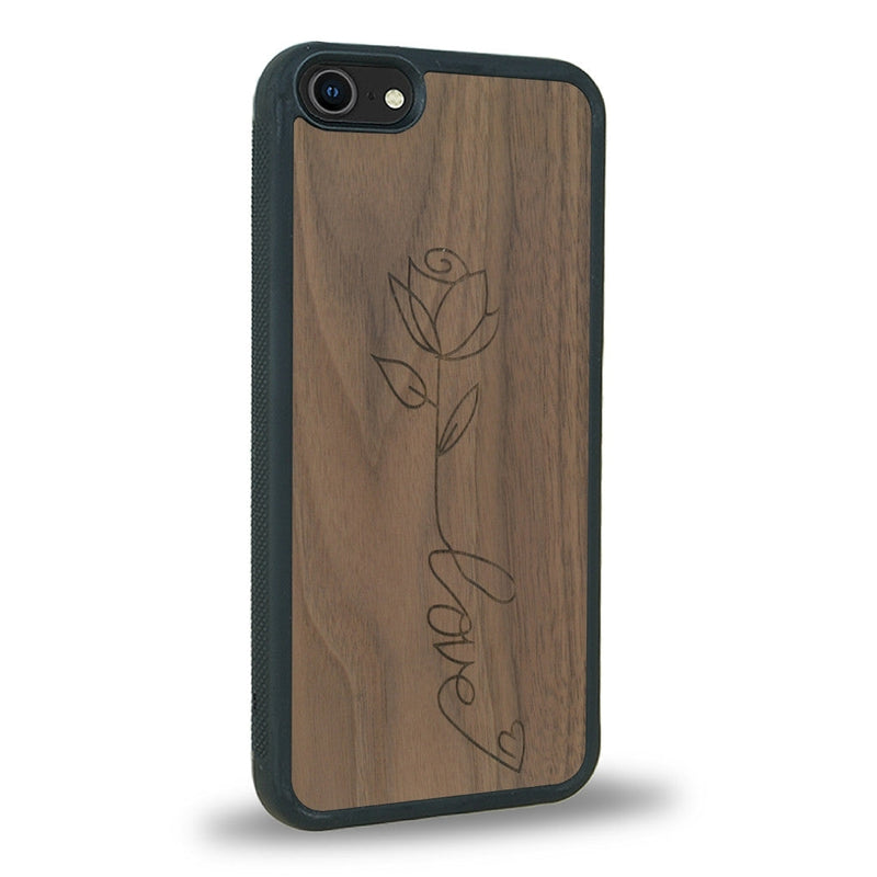 Coque de protection en bois véritable fabriquée en France pour iPhone 5 / 5s sur le thème de la fête des mères avec un motif représentant une fleur dont la tige forme le mot "love"