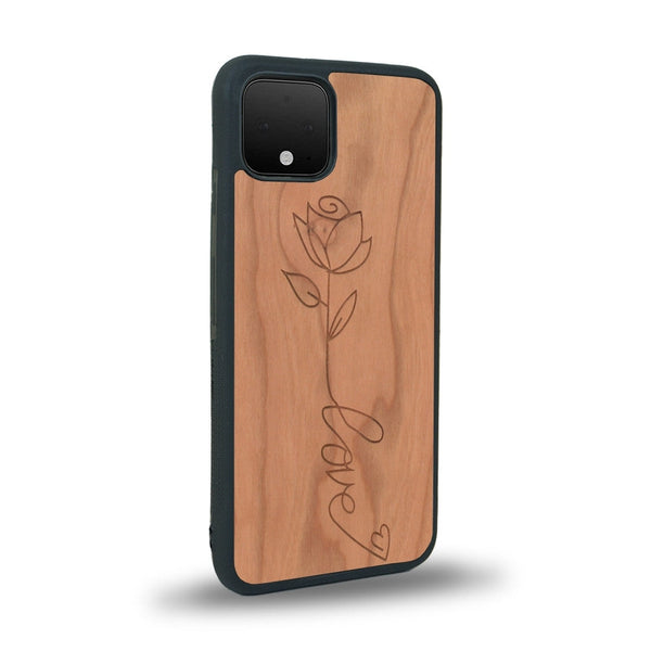 Coque de protection en bois véritable fabriquée en France pour Google Pixel 4 sur le thème de la fête des mères avec un motif représentant une fleur dont la tige forme le mot "love"