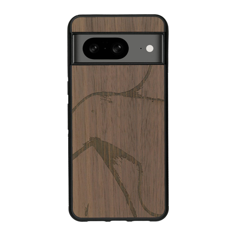 Coque de protection en bois véritable fabriquée en France pour Google Pixel 7A représentant une silhouette féminine dessinée à la main par l'artiste Maud Dabs