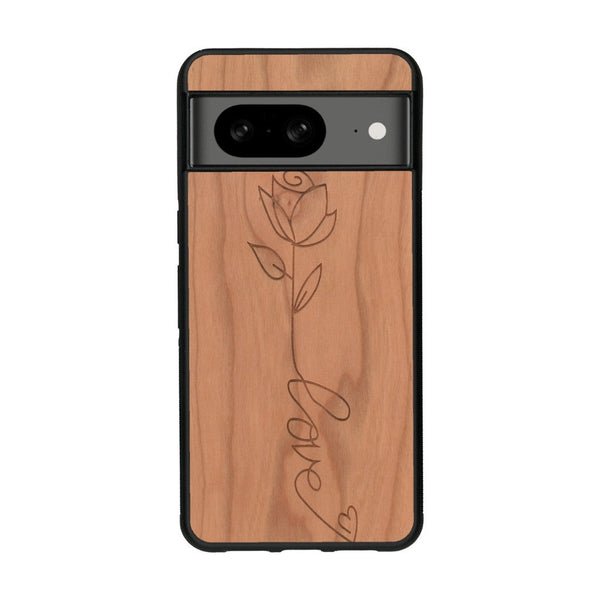 Coque de protection en bois véritable fabriquée en France pour Google Pixel 8 sur le thème de la fête des mères avec un motif représentant une fleur dont la tige forme le mot "love"