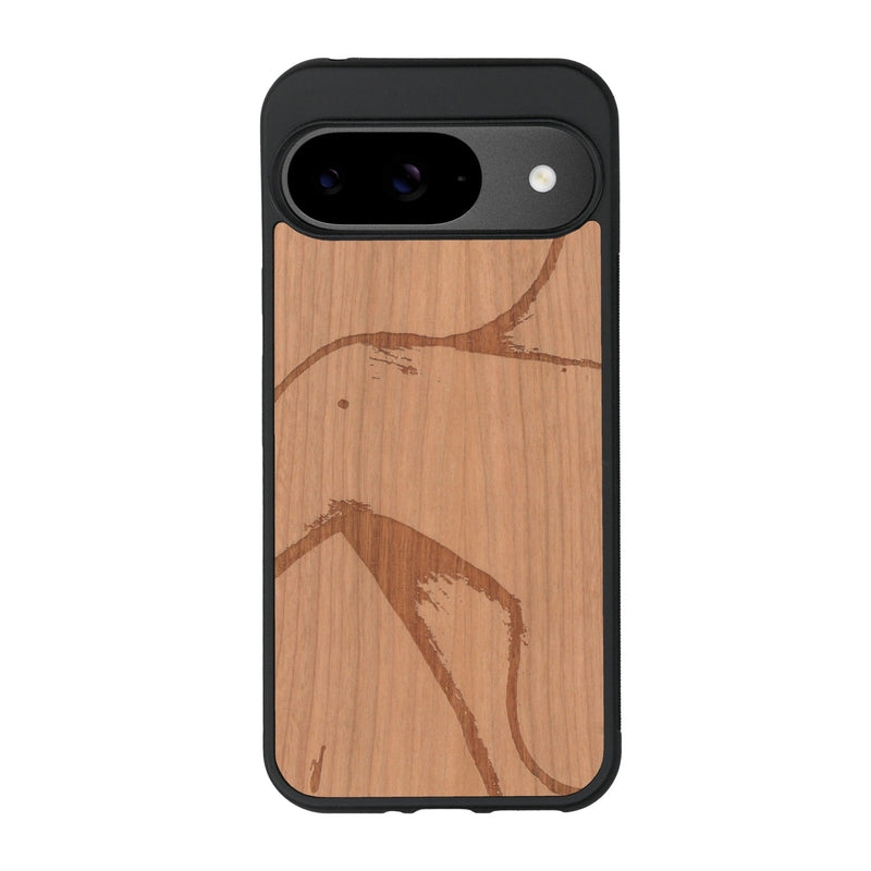 Coque de protection en bois véritable fabriquée en France pour Google Pixel 9 représentant une silhouette féminine dessinée à la main par l'artiste Maud Dabs