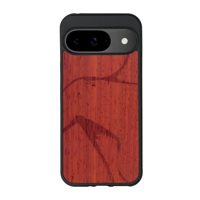 Coque de protection en bois véritable fabriquée en France pour Google Pixel 9 représentant une silhouette féminine dessinée à la main par l'artiste Maud Dabs