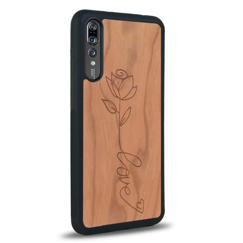 Coque de protection en bois véritable fabriquée en France pour Huawei P20 sur le thème de la fête des mères avec un motif représentant une fleur dont la tige forme le mot "love"