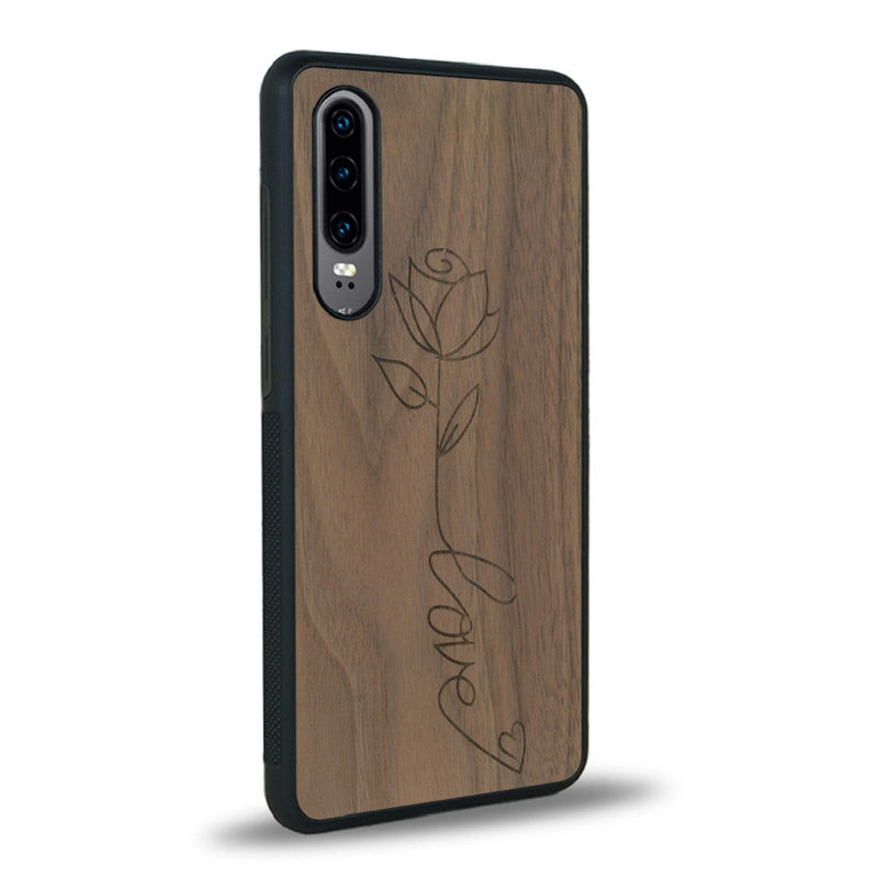 Coque de protection en bois véritable fabriquée en France pour Huawei P30 sur le thème de la fête des mères avec un motif représentant une fleur dont la tige forme le mot "love"