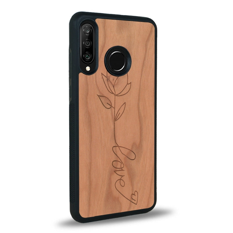 Coque de protection en bois véritable fabriquée en France pour Huawei P30 Lite sur le thème de la fête des mères avec un motif représentant une fleur dont la tige forme le mot "love"