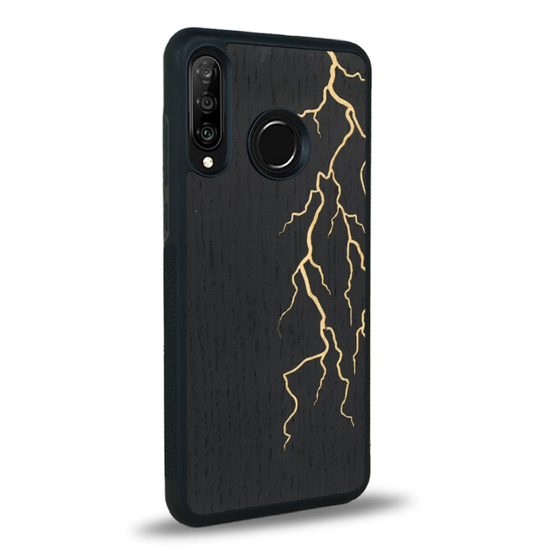 Coque de protection en bois véritable fabriquée en France pour Huawei P30 Lite alliant plusieurs essences de bois pour représenter un éclair divin