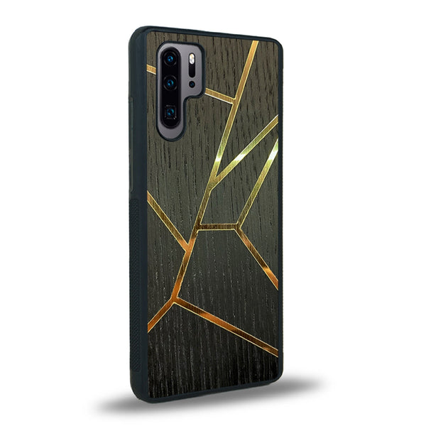 Coque de protection en bois véritable fabriquée en France pour Huawei P30 Pro alliant plusieurs essences de bois pour représenter des fragments design