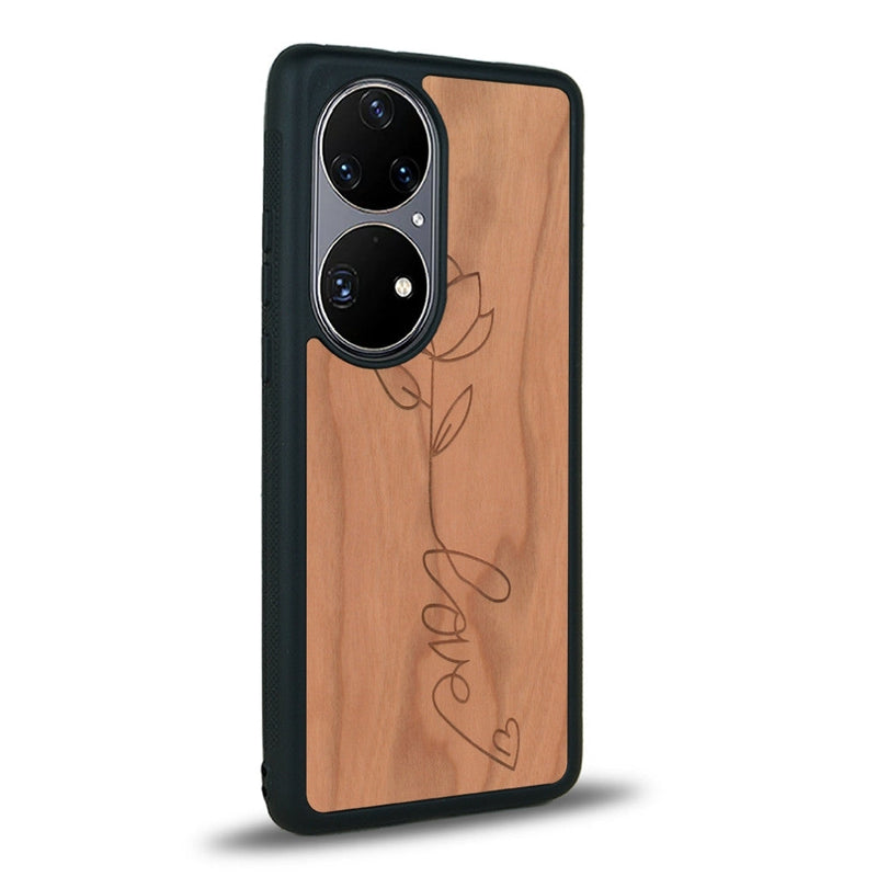 Coque de protection en bois véritable fabriquée en France pour Huawei P50 sur le thème de la fête des mères avec un motif représentant une fleur dont la tige forme le mot "love"