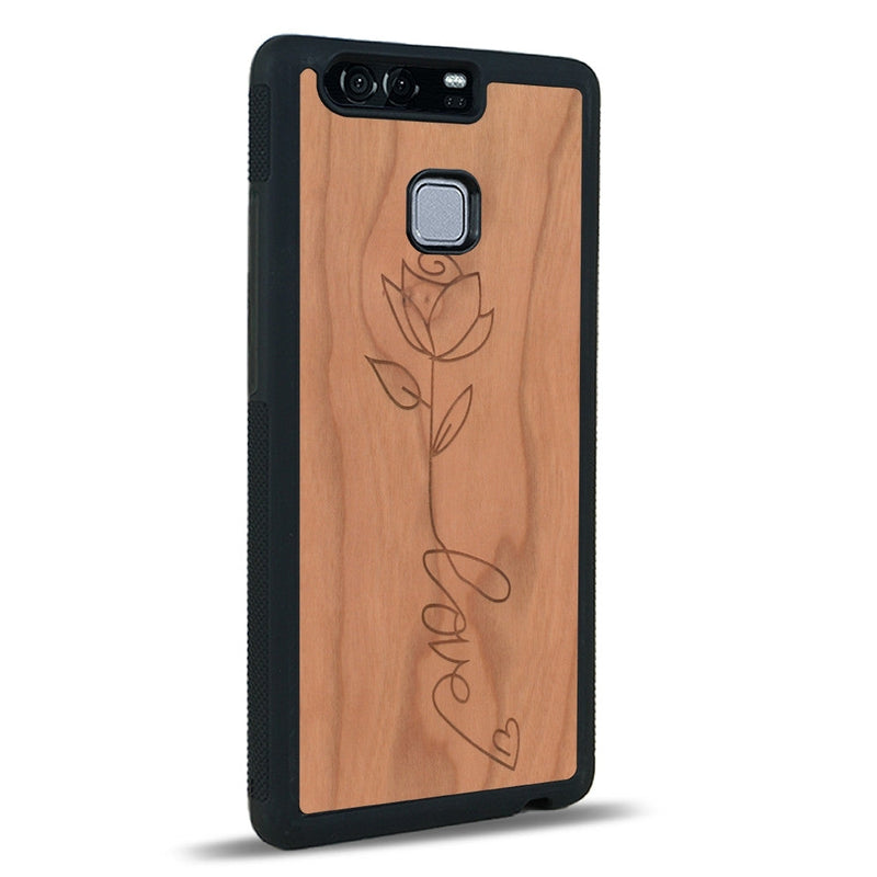 Coque de protection en bois véritable fabriquée en France pour Huawei P9 sur le thème de la fête des mères avec un motif représentant une fleur dont la tige forme le mot "love"