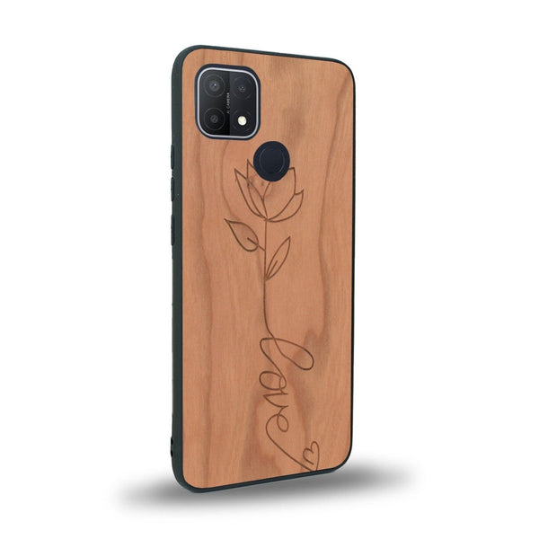 Coque de protection en bois véritable fabriquée en France pour Oppo A15 sur le thème de la fête des mères avec un motif représentant une fleur dont la tige forme le mot "love"