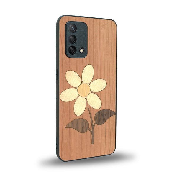 Coque de protection en bois véritable fabriquée en France pour Oppo A74 4G alliant plusieurs essences de bois pour représenter une marguerite