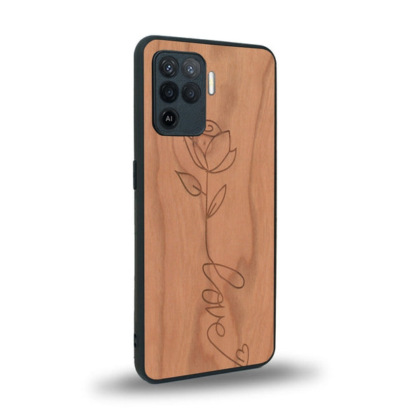 Coque de protection en bois véritable fabriquée en France pour Oppo A94 sur le thème de la fête des mères avec un motif représentant une fleur dont la tige forme le mot "love"