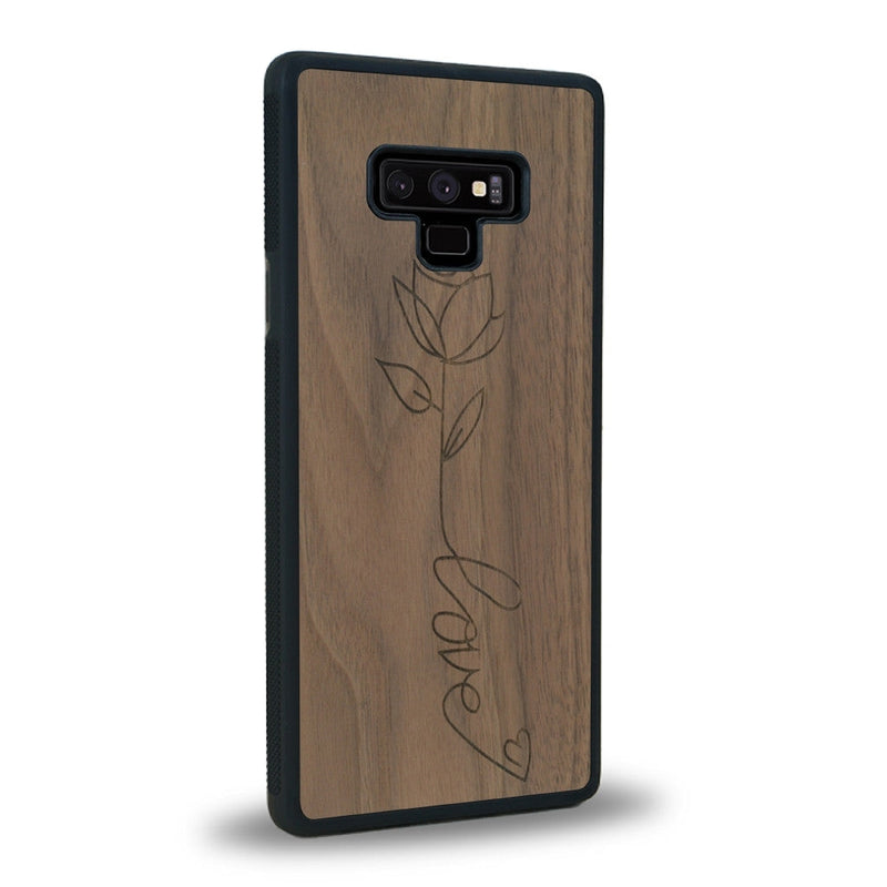 Coque de protection en bois véritable fabriquée en France pour Samsung Note 9 sur le thème de la fête des mères avec un motif représentant une fleur dont la tige forme le mot "love"