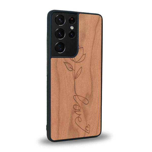 Coque de protection en bois véritable fabriquée en France pour Samsung S20 Ultra sur le thème de la fête des mères avec un motif représentant une fleur dont la tige forme le mot "love"