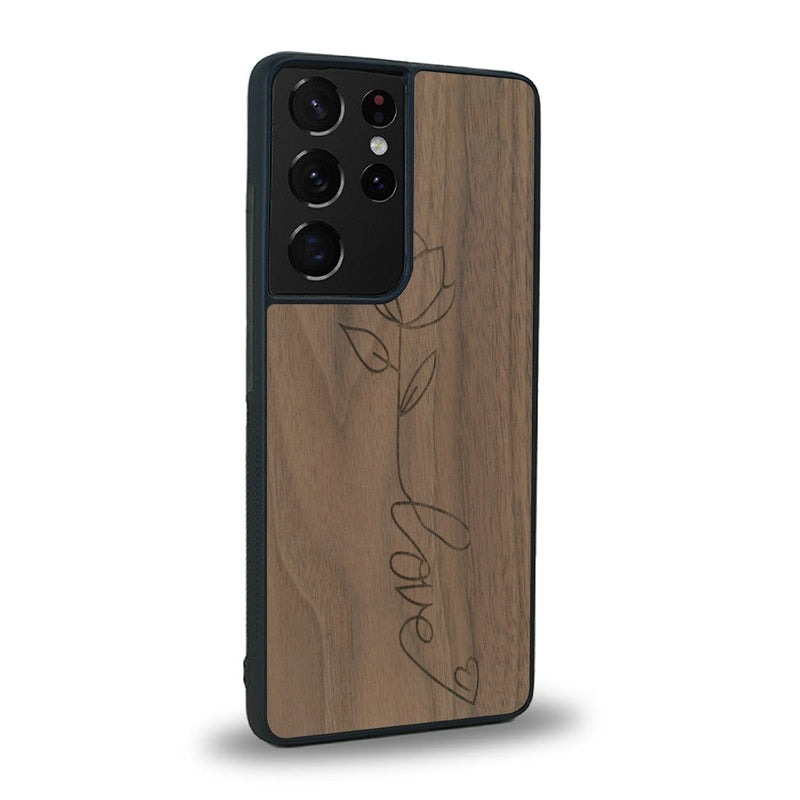 Coque de protection en bois véritable fabriquée en France pour Samsung S20 Ultra sur le thème de la fête des mères avec un motif représentant une fleur dont la tige forme le mot "love"