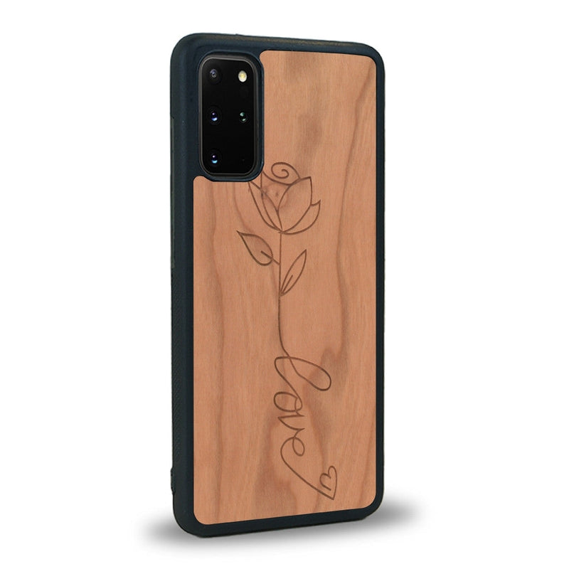 Coque de protection en bois véritable fabriquée en France pour Samsung S20FE sur le thème de la fête des mères avec un motif représentant une fleur dont la tige forme le mot "love"