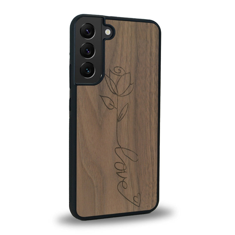 Coque de protection en bois véritable fabriquée en France pour Samsung S21FE sur le thème de la fête des mères avec un motif représentant une fleur dont la tige forme le mot "love"