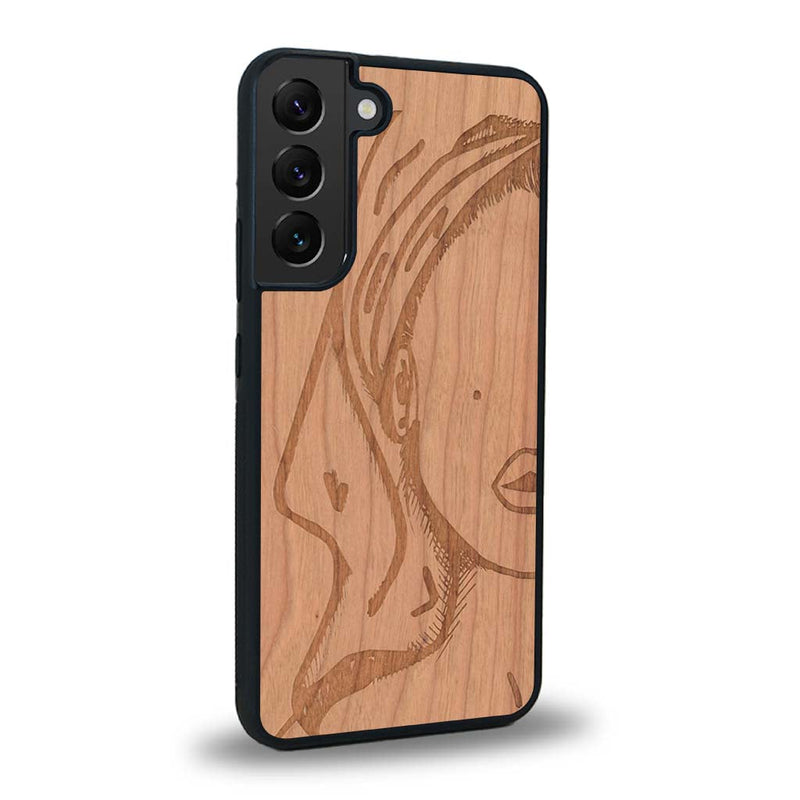 Coque de protection en bois véritable fabriquée en France pour Samsung S24 représentant une silhouette féminine épurée de type line art en collaboration avec l'artiste Maud Dabs