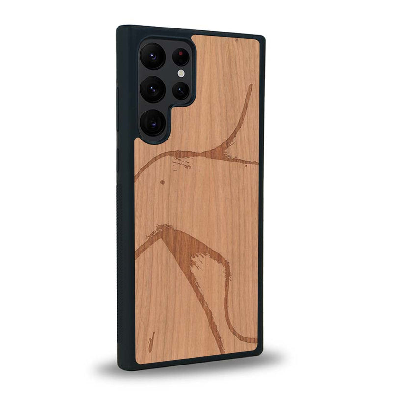 Coque de protection en bois véritable fabriquée en France pour Samsung S24 Ultra représentant une silhouette féminine dessinée à la main par l'artiste Maud Dabs