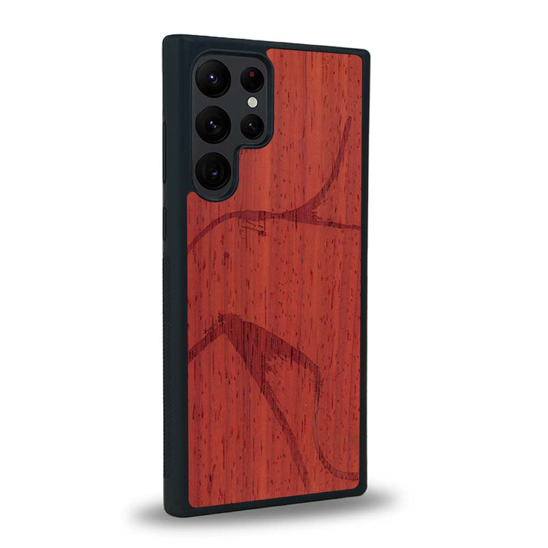 Coque de protection en bois véritable fabriquée en France pour Samsung S24 Ultra représentant une silhouette féminine dessinée à la main par l'artiste Maud Dabs