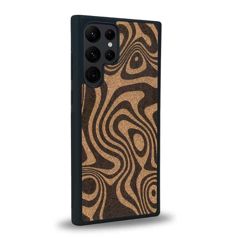 Coque de protection en bois véritable fabriquée en France pour Samsung S24 Ultra avec un motif abstrait représentant les mouvements de l'eau