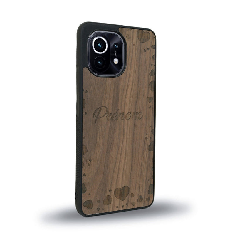 Coque de protection en bois véritable fabriquée en France pour Xiaomi Mi 11 sur le thème de la fête des mères avec un motif représentant des coeurs et des feuilles