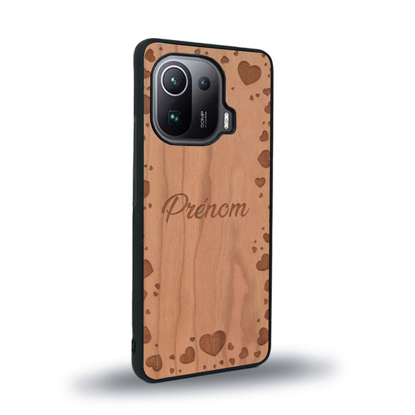 Coque de protection en bois véritable fabriquée en France pour Xiaomi Mi 11 Ultra sur le thème de la fête des mères avec un motif représentant des coeurs et des feuilles