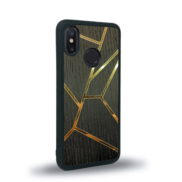 Coque de protection en bois véritable fabriquée en France pour Xiaomi Mi 8 alliant plusieurs essences de bois pour représenter des fragments design