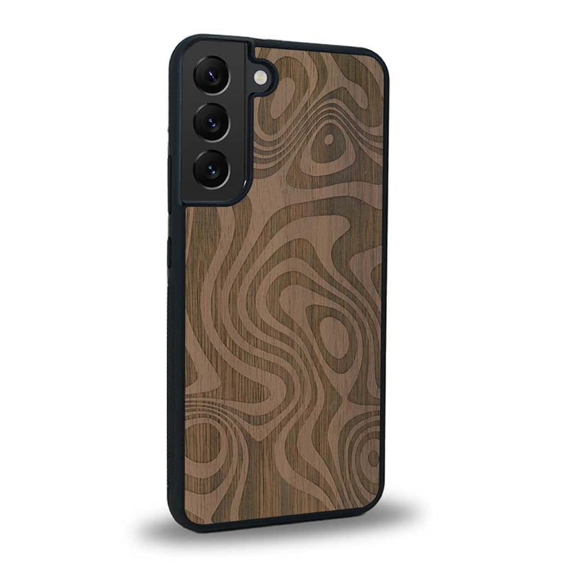 Coque de protection en bois véritable fabriquée en France pour Samsung S23FE avec un motif abstrait représentant les mouvements de l'eau