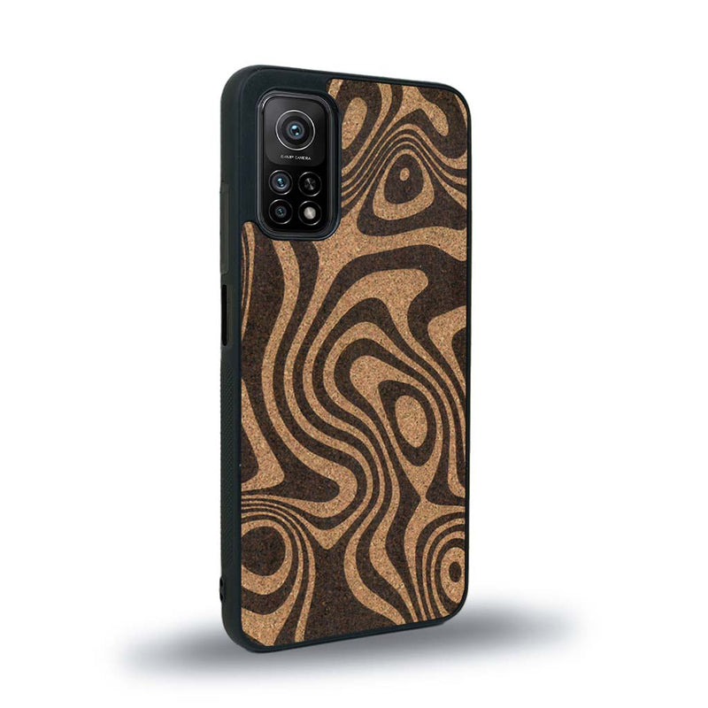 Coque de protection en bois véritable fabriquée en France pour Xiaomi Mi 10T Pro avec un motif abstrait représentant les mouvements de l'eau