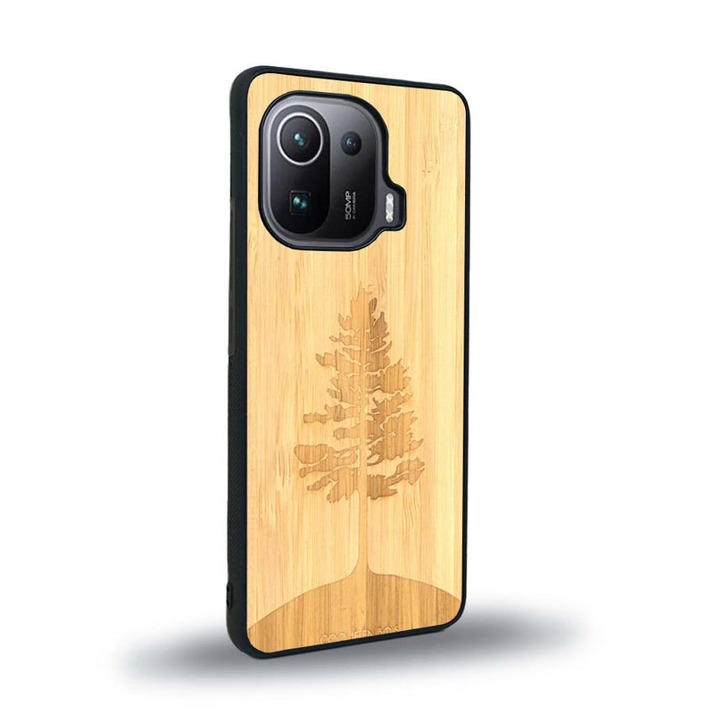 Coque de protection en bois véritable fabriquée en France pour Xiaomi Mi 11 Ultra sur le thème de la nature, de la fôret et de l'écoresponsabilité avec une gravure représentant un arbre 