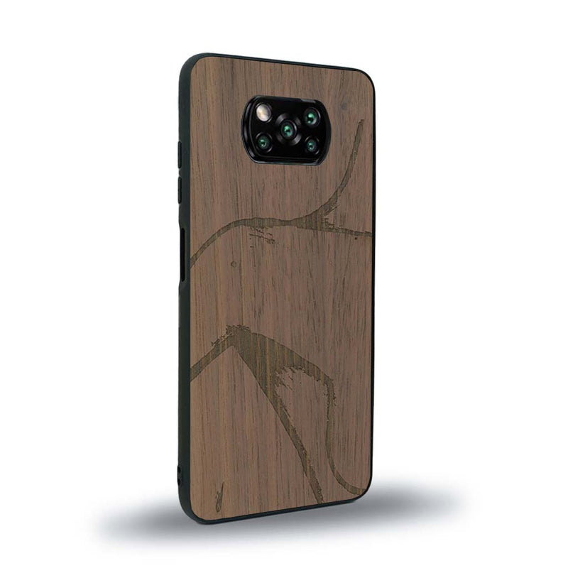 Coque de protection en bois véritable fabriquée en France pour Xiaomi Poco X3 Nfc représentant une silhouette féminine dessinée à la main par l'artiste Maud Dabs