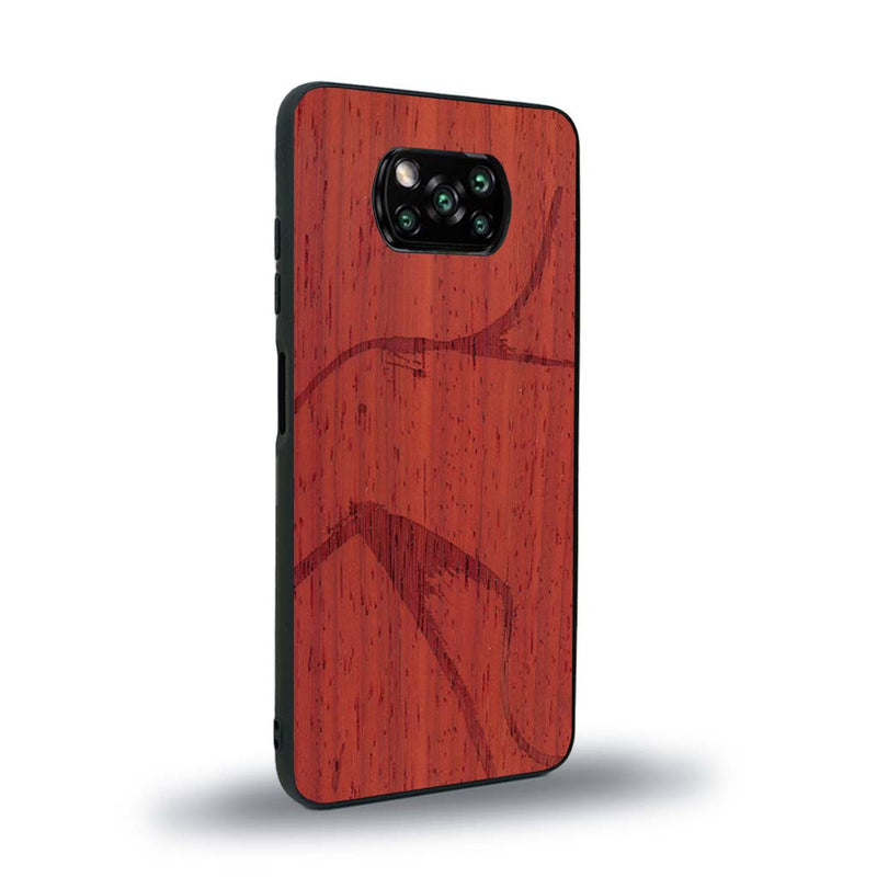 Coque de protection en bois véritable fabriquée en France pour Xiaomi Poco X3 Nfc représentant une silhouette féminine dessinée à la main par l'artiste Maud Dabs