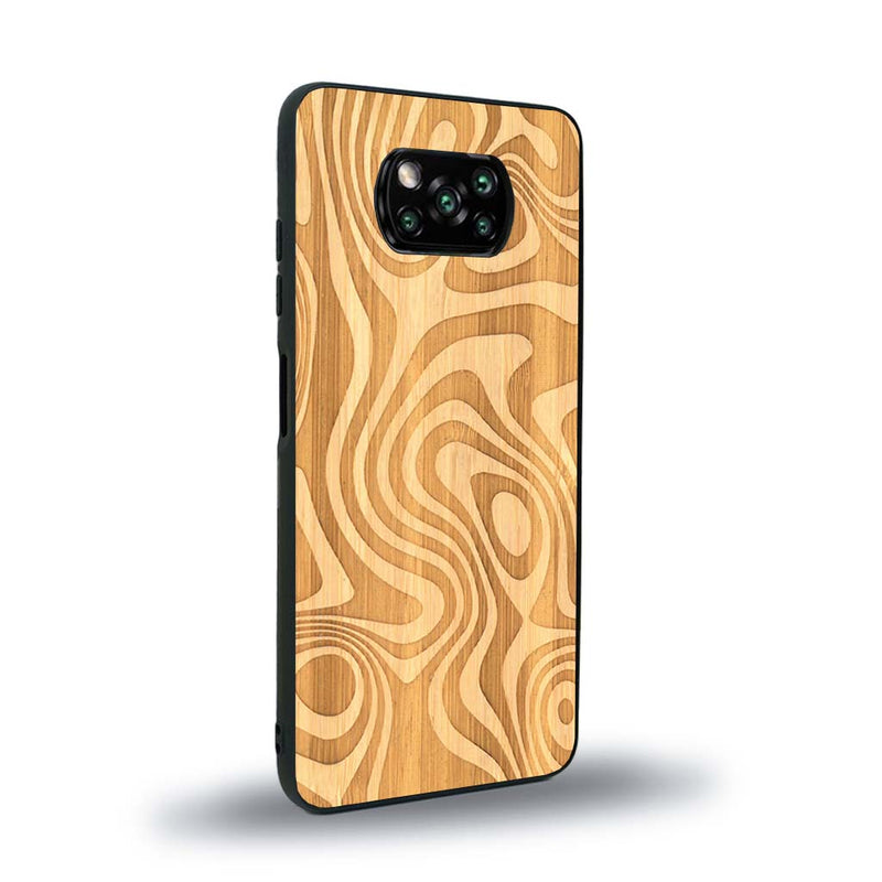 Coque de protection en bois véritable fabriquée en France pour Xiaomi Poco X3 Nfc avec un motif abstrait représentant les mouvements de l'eau