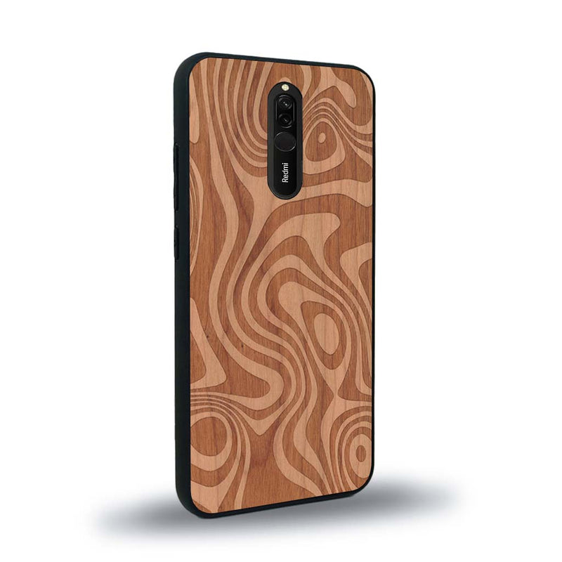 Coque de protection en bois véritable fabriquée en France pour Xiaomi Redmi 8 avec un motif abstrait représentant les mouvements de l'eau