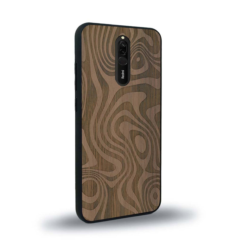 Coque de protection en bois véritable fabriquée en France pour Xiaomi Redmi 8 avec un motif abstrait représentant les mouvements de l'eau